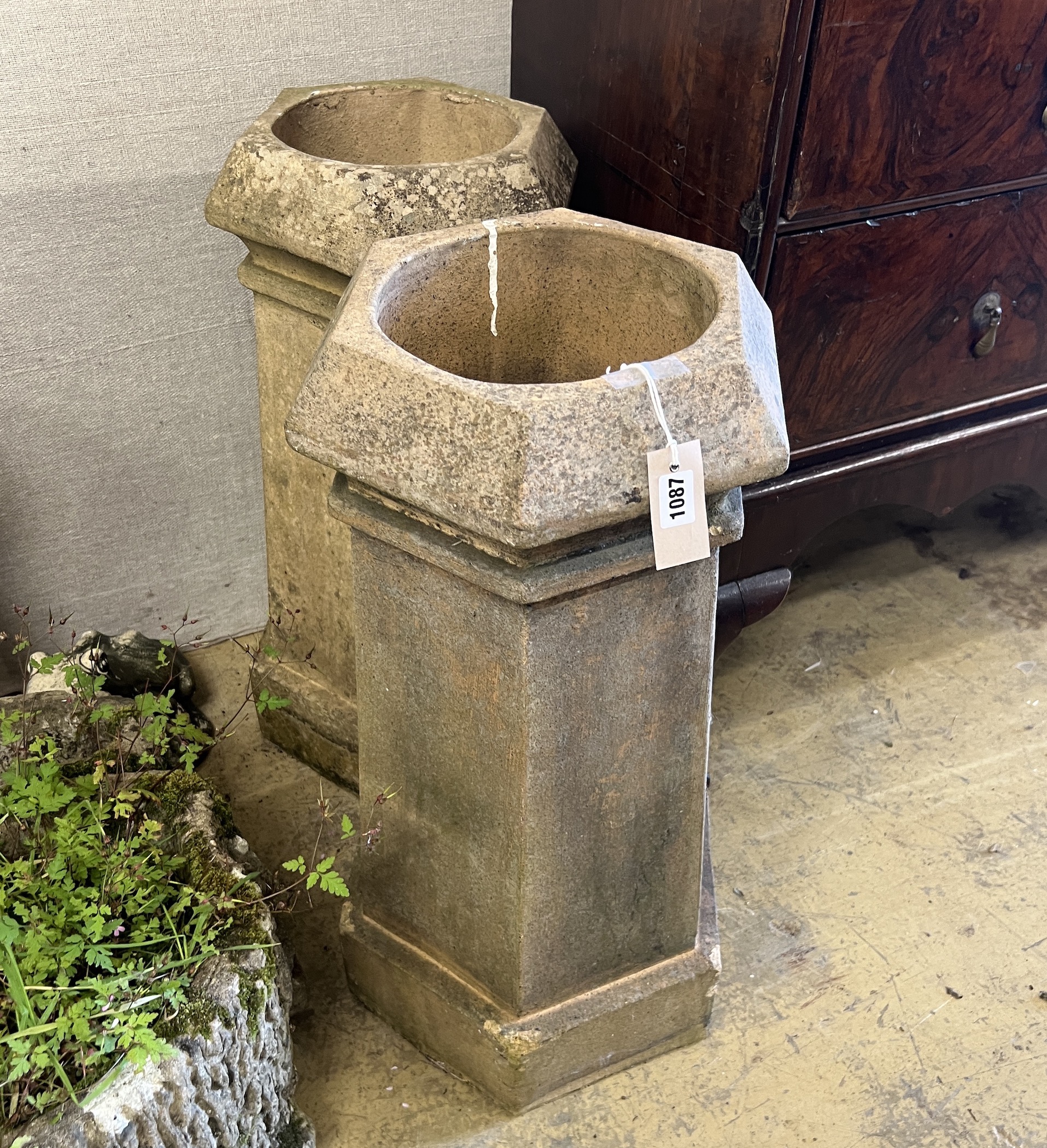 A pair of hexagonal terracotta chimney pots, height 69cm